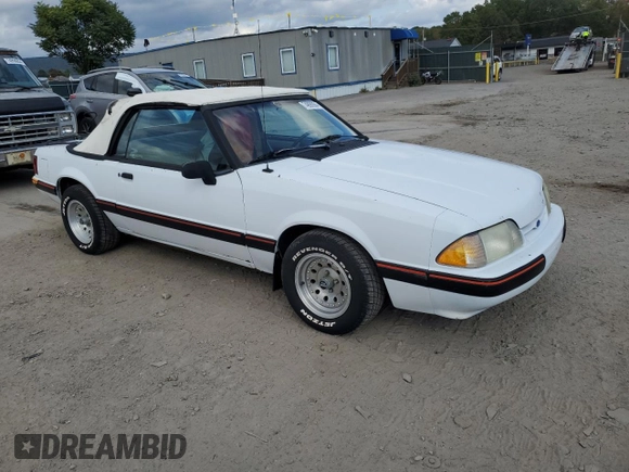 1989 Ford Mustang with VIN 1FABP44A5KF214843, listed as a Copart auction lot 74890984 with 65,601 mi miles and Clean title. Bid and sale history available at DreamBid. Image 4.