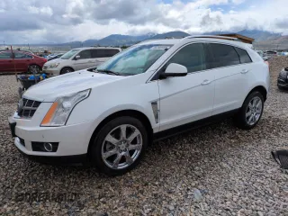 2010 Cadillac SRX Premium Collection z VIN 3GYFNFEY0AS530437, wystawiony jako Copart lot #56390565 z przebiegiem 153 554 mil mil oraz Szkoda całkowita • Salvage title. Historia ofert i sprzedaży dostępna na DreamBid. Obrazek 1.