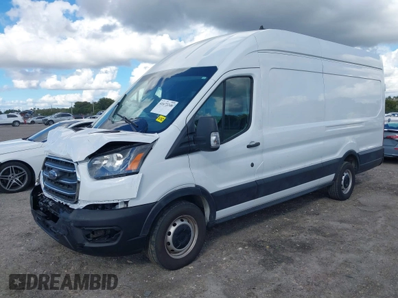 2021 Ford Transit Cargo with VIN 1FTBW3X8XMKA14051, listed as a IAAI auction lot 41672248 with 127,438 mi miles. Bid and sale history available at carsss.com. Image 2.