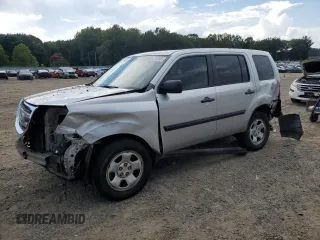 2011 Honda Pilot LX with VIN 5FNYF3H20BB023453, listed as a Copart auction lot 64778385 with 202,409 mi miles and Salvage title. Bid and sale history available at DreamBid. Image 1.