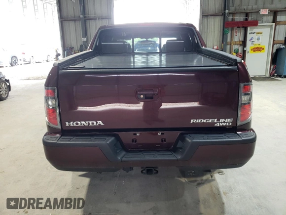 2013 Honda Ridgeline RTL with VIN 5FPYK1F59DB018582, listed as a Copart auction lot 61022245 with 126,892 mi miles and Salvage title. Bid and sale history available at DreamBid. Image 6.
