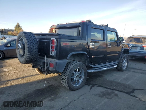 2005 Hummer H2 SUT z VIN 5GRGN22U15H101289, wystawiony jako Copart lot #84107974 z przebiegiem Nie podano mil oraz Szkody całkowita. Historia ofert i sprzedaży dostępna na DreamBid. Obrazek 3.