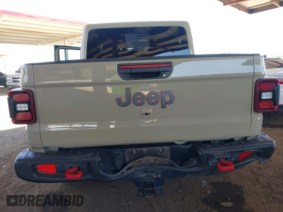 2022 Jeep Gladiator Rubicon with VIN 1C6JJTBG2NL164117, listed as a IAAI auction lot 42450350 with 22,326 mi miles and . Bid and sale history available at DreamBid. Image 6.