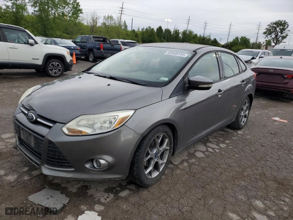 2013 Ford Focus SE with VIN 1FADP3F25DL128574, listed as a Copart auction lot 52548144 with 123,764 mi miles and Salvage Title. Bid and sale history available at carsss.com. Image 1.
