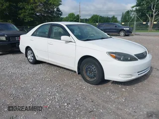 2002 Toyota Camry LE z VIN 4T1BE32K52U085550, wystawiony jako IAAI lot #42504739 z przebiegiem 92 639 mil mil oraz . Historia ofert i sprzedaży dostępna na DreamBid. Obrazek 1.