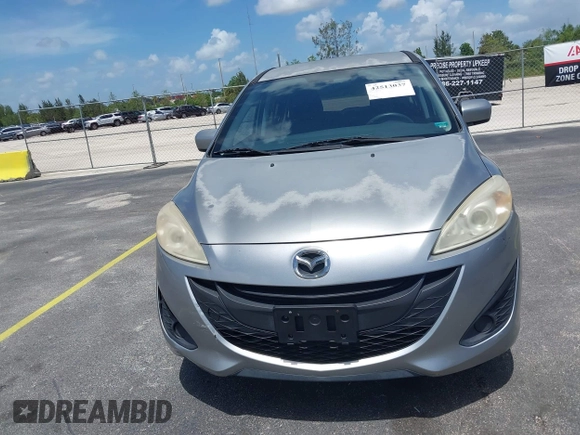 2012 Mazda 5 Sport with VIN JM1CW2BL8C0129591, listed as a IAAI auction lot 42513037 with 177,206 mi miles and . Bid and sale history available at DreamBid. Image 6.