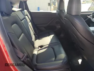 2024 Tesla Model Y Long Range z VIN 7SAYGAEEXRF071829, wystawiony jako Copart lot #56003215 z przebiegiem 29 446 mil mil oraz Szkoda całkowita • Salvage title. Historia ofert i sprzedaży dostępna na DreamBid. Obrazek 10.