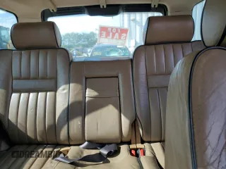 2001 Land Rover Range Rover z VIN SALPM16461A455877, wystawiony jako Copart lot #73062514 z przebiegiem Nie podano mil oraz Czysty tytuł • Clean title. Historia ofert i sprzedaży dostępna na DreamBid. Obrazek 10.