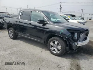 2025 Honda Ridgeline RTL with VIN 5FPYK3F52SB014785, listed as a Copart auction lot 59982875 with 2,341 mi miles and Salvage title. Bid and sale history available at DreamBid. Image 4.