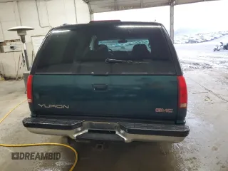 1998 GMC Yukon with VIN 1GKEC13RXWJ731667, listed as a Copart auction lot 78848954 with 202,164 mi miles and Salvage Title. Bid and sale history available at carsss.com. Image 6.