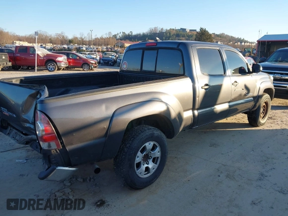 2015 Toyota Tacoma with VIN 3TMMU4FN5FM077680, listed as a IAAI auction lot 41008355 with 221,940 mi miles. Bid and sale history available at carsss.com. Image 4.