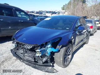 2023 Tesla Model 3 with VIN 5YJ3E1EA8PF671465, listed as a IAAI auction lot 41599200 with 21,859 mi miles. Bid and sale history available at carsss.com. Image 19.