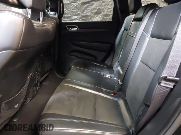 2021 Jeep Grand Cherokee Laredo X with VIN 1C4RJFAG3MC647726, listed as a IAAI auction lot 38421907 with 56,514 mi miles and . Bid and sale history available at DreamBid. Image 8.