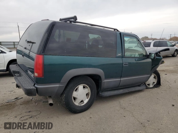 1998 Chevrolet Tahoe z VIN 3GNEK18R4WG128424, wystawiony jako Copart lot #79684984 z przebiegiem 217 456 mil mil oraz Szkoda całkowita • Salvage title. Historia ofert i sprzedaży dostępna na DreamBid. Obrazek 3.