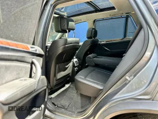 2012 BMW X5 35i with VIN 5UXZV4C55CL986439, listed as a Copart auction lot 63034725 with 188,238 mi miles and Clean title. Bid and sale history available at DreamBid. Image 6.