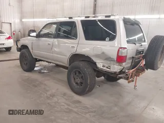 1998 Toyota 4Runner SR5 with VIN JT3HN86R1W0180174, listed as a IAAI auction lot 42065817 with 252,961 mi miles and . Bid and sale history available at DreamBid. Image 3.