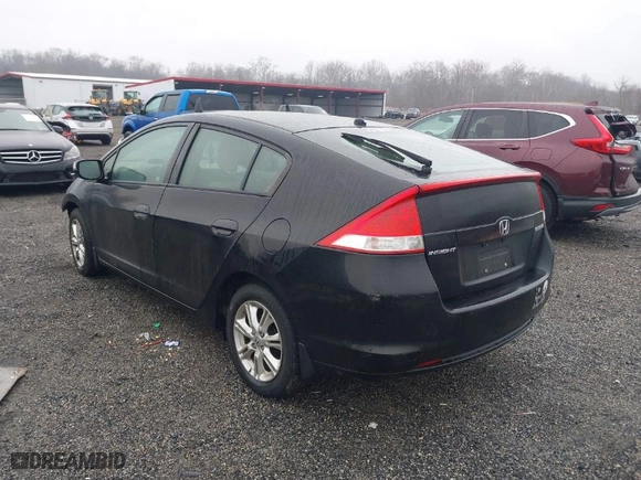 2011 Honda Insight EX with VIN JHMZE2H76BS010964, listed as a IAAI auction lot 41464087 with 122,380 mi miles. Bid and sale history available at carsss.com. Image 3.