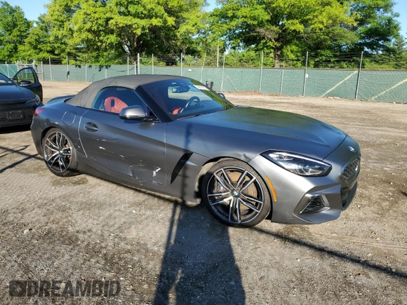 2020 BMW Z4 sDriveM40i z VIN WBAHF9C00LWW76934, wystawiony jako Copart lot #55810755 z przebiegiem 52 230 mil mil oraz Szkody całkowita. Historia ofert i sprzedaży dostępna na DreamBid. Obrazek 4.