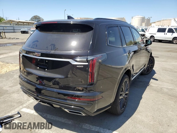 2023 Cadillac XT6 AWD Sport z VIN 1GYKPGRS2PZ130847, wystawiony jako Copart lot #58174474 z przebiegiem 11 958 mil mil oraz Tytuł czysty. Historia ofert i sprzedaży dostępna na DreamBid. Obrazek 3.