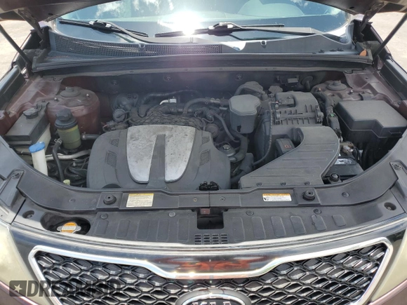 2012 Kia Sorento SX with VIN 5XYKW4A29CG308152, listed as a Copart auction lot 64895355 with 126,816 mi miles and Salvage title. Bid and sale history available at DreamBid. Image 12.