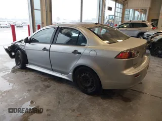 2010 Mitsubishi Lancer DE with VIN JA32U1FU3AU019390, listed as a IAAI auction lot 39876469 with 188,617 mi miles. Bid and sale history available at carsss.com. Image 3.