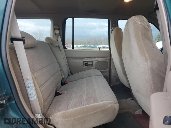 1998 Ford Explorer XL z VIN 1FMZU34X8WZB89467, wystawiony jako Copart lot #49973325 z przebiegiem 168 026 mil mil oraz Czysty tytuł • Clean title. Historia ofert i sprzedaży dostępna na DreamBid. Obrazek 11.