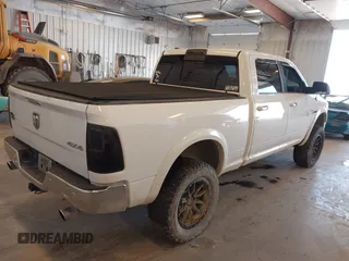 2015 Ram 1500 Laramie Limited with VIN 1C6RR7WM6FS678840, listed as a IAAI auction lot 42040449 with Not provided miles and . Bid and sale history available at DreamBid. Image 4.