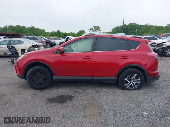 2017 Toyota RAV4 LE with VIN JTMBFREV8HJ161427, listed as a IAAI auction lot 42333851 with 121,161 mi miles and . Bid and sale history available at DreamBid. Image 14.