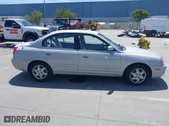 2004 Hyundai Elantra GLS z VIN KMHDN46D74U781436, wystawiony jako IAAI lot #42260519 z przebiegiem 132 943 mil mil oraz . Historia ofert i sprzedaży dostępna na DreamBid. Obrazek 13.