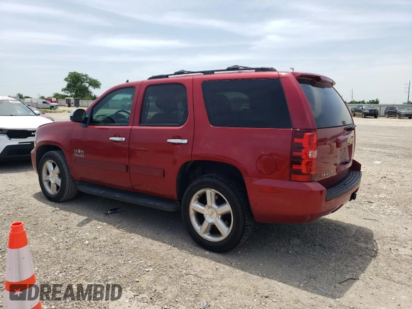 2012 Chevrolet Tahoe LS with VIN 1GNSCAE01CR227459, listed as a Copart auction lot 56353955 with 201,836 mi miles and Salvage title. Bid and sale history available at DreamBid. Image 2.