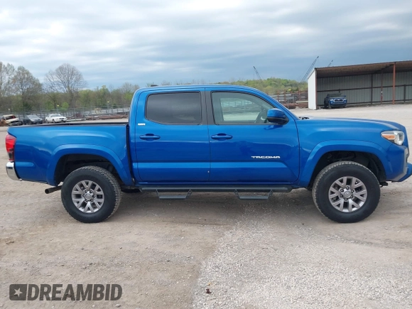 2018 Toyota Tacoma SR5 with VIN 3TMAZ5CNXJM069212, listed as a IAAI auction lot 42010564 with 73,825 mi miles and . Bid and sale history available at DreamBid. Image 13.