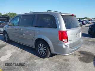 2015 Dodge Grand Caravan SXT with VIN 2C4RDGCG3FR592098, listed as a IAAI auction lot 42038665 with 104,092 mi miles and . Bid and sale history available at DreamBid. Image 3.