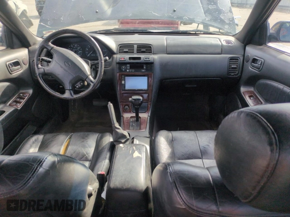 1997 Nissan Maxima GXE with VIN JN1CA21D0VT201140, listed as a Copart auction lot 52230495 with 286,440 mi miles and Clean title. Bid and sale history available at DreamBid. Image 8.