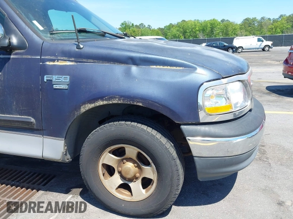 1999 Ford F-150 with VIN 1FTRX17W9XNB32397, listed as a IAAI auction lot 42048746 with 290,179 mi miles and . Bid and sale history available at DreamBid. Image 6.