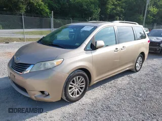 2011 Toyota Sienna XLE AAS with VIN 5TDYK3DC7BS008535, listed as a IAAI auction lot 42589645 with 208,624 mi miles and . Bid and sale history available at DreamBid. Image 2.