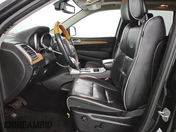 2013 Jeep Grand Cherokee Overland with VIN 1C4RJECT3DC534007, listed as a Copart auction lot 42062385 with 127,873 mi miles and Clean Title. Bid and sale history available at carsss.com. Image 7.