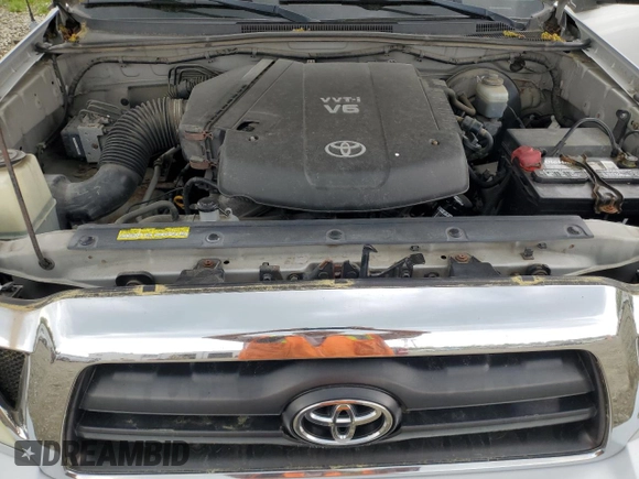 2005 Toyota Tacoma z VIN 5TEMU52N35Z126145, wystawiony jako Copart lot #55391105 z przebiegiem 150 046 mil mil oraz Szkoda całkowita • Salvage title. Historia ofert i sprzedaży dostępna na DreamBid. Obrazek 11.