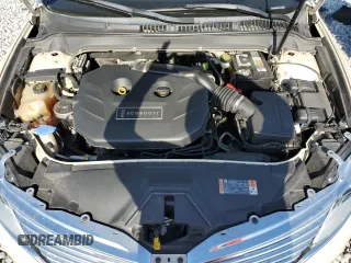 2016 Lincoln MKZ z VIN 3LN6L2G93GR615052, wystawiony jako Copart lot #54717335 z przebiegiem 86 575 mil mil oraz Szkoda całkowita • Salvage title. Historia ofert i sprzedaży dostępna na DreamBid. Obrazek 11.