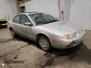 2000 Saturn SL with VIN 1G8ZK5273YZ239987, listed as a Copart auction lot 41577615 with 145,659 mi miles and Salvage title. Bid and sale history available at DreamBid. Image 4.
