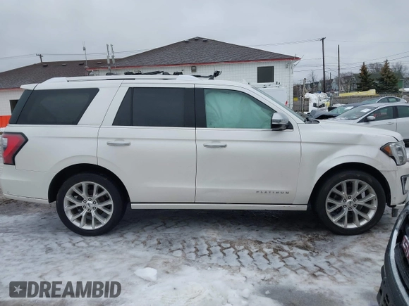 2019 Ford Expedition Platinum with VIN 1FMJU1MT8KEA24308, listed as a IAAI auction lot 41510256 with 143,011 mi miles. Bid and sale history available at carsss.com. Image 13.