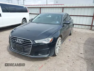 2016 Audi A6 2.0T Premium Plus with VIN WAUGFAFC1GN012799, listed as a IAAI auction lot 42141346 with 101,506 mi miles. Bid and sale history available at carsss.com. Image 17.