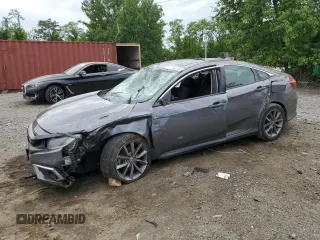 2019 Honda Civic EX z VIN 19XFC1F36KE212839, wystawiony jako Copart lot #57790535 z przebiegiem 74 870 mil mil oraz Szkoda całkowita • Salvage title. Historia ofert i sprzedaży dostępna na DreamBid. Obrazek 1.