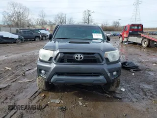 2014 Toyota Tacoma with VIN 3TMLU4EN0EM148389, listed as a IAAI auction lot 41490721 with 119,731 mi miles. Bid and sale history available at carsss.com. Image 12.