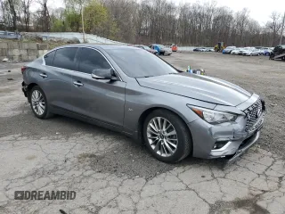 2019 Infiniti Q50 Luxe с VIN JN1EV7AR8KM594199, выставлен на аукционе Copart как лот 53190725 с пробегом 82 879 миль миль и Списание • Salvage title. История ставок и продаж доступна на DreamBid. Изображение 4.