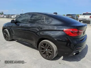 2016 BMW X6 xDrive50i z VIN 5UXKU6C57G0R34222, wystawiony jako Copart lot #57618755 z przebiegiem 133 501 mil mil oraz Czysty tytuł • Clean title. Historia ofert i sprzedaży dostępna na DreamBid. Obrazek 2.
