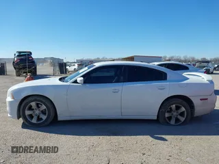 2014 Dodge Charger SXT with VIN 2C3CDXHG2EH104640, listed as a IAAI auction lot 41379760 with 122,664 mi miles and . Bid and sale history available at DreamBid. Image 14.