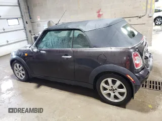 2015 MINI Convertible z VIN WMWZN3C59FT266929, wystawiony jako Copart lot #57264985 z przebiegiem 110 200 mil mil oraz Szkoda całkowita • Salvage title. Historia ofert i sprzedaży dostępna na DreamBid. Obrazek 2.