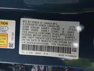 2025 Honda Civic Sedan Hybrid Sport with VIN 2HGFE4F84SH323984, listed as a IAAI auction lot 41602995 with 63 mi miles. Bid and sale history available at carsss.com. Image 9.