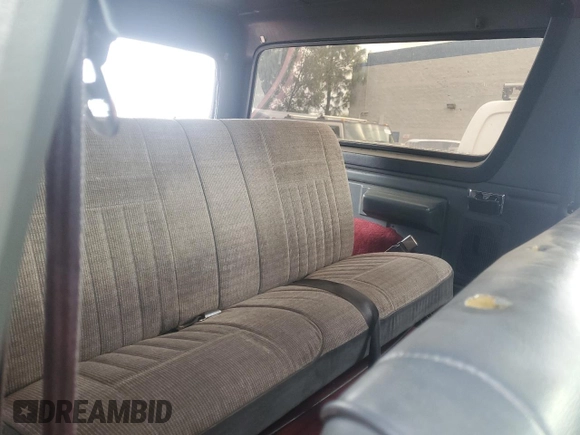 1991 Ford Bronco Custom with VIN 1FMEU15H0MLA44126, listed as a Copart auction lot 82401324 with 79,550 mi miles and Salvage Title. Bid and sale history available at DreamBid. Image 11.
