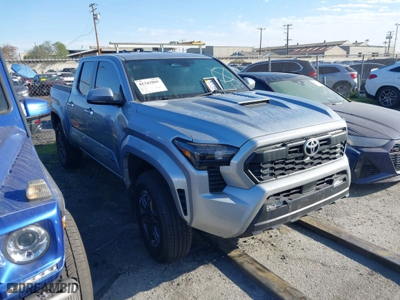 2024 Toyota Tacoma 4WD SR5 with VIN 3TMLB5JN4RM021667, listed as a IAAI auction lot 41343801 with 5,037 mi miles. Bid and sale history available at carsss.com. Image 1.